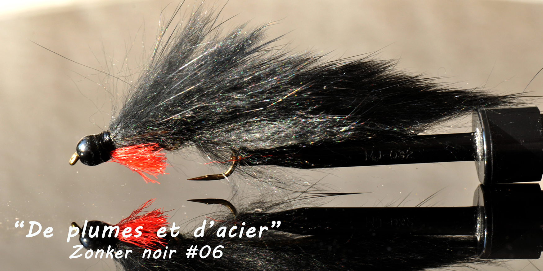 Mouches de pêche "De plumes et d'acier"Zonker noir # 06